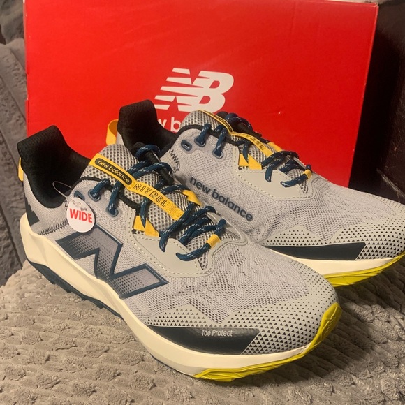 New Balance Men's Gray and Blue Sneakers with Yellow Accents